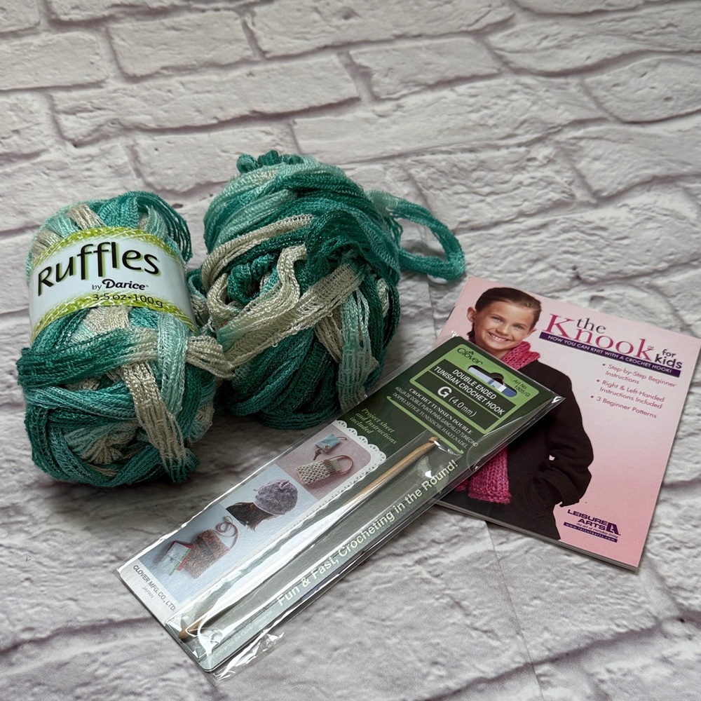 Darice Ruffles Yarn in Green and Cream book and crochet hook